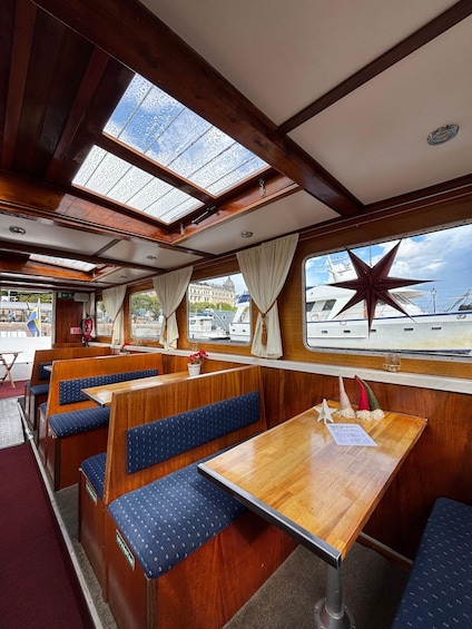 Picture 2 for Activity Stockholm: Live Guided City Sightseeing Open Boat Tour 2