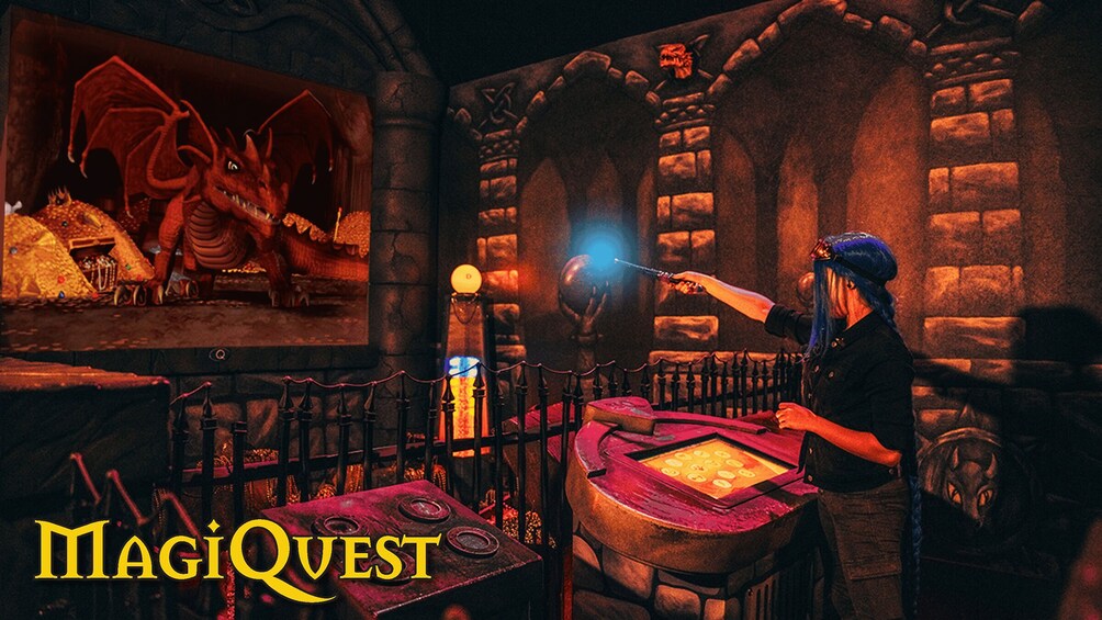 A dimly lit room with a dragon painting, a table with a glowing orb, and a person pointing a wand. 5