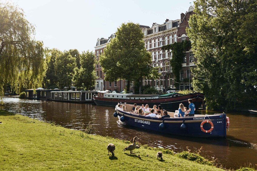 Picture 14 for Activity Amsterdam: Modern Canal Cruise with Local Guide, Bar & Bites 5