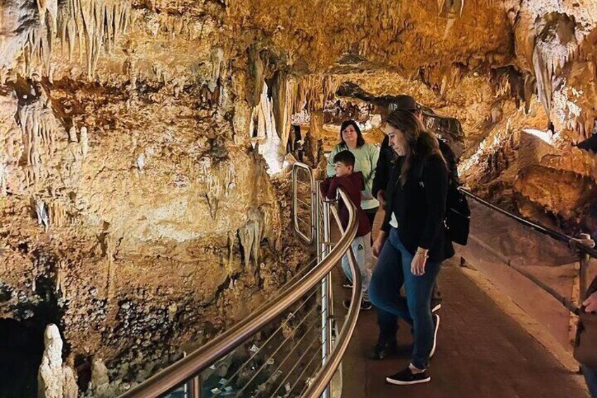 A cave with stalactites and stalagmites. 1