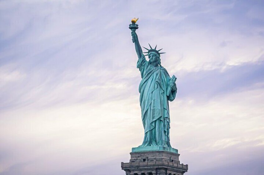 The Statue of Liberty holding a torch. 1