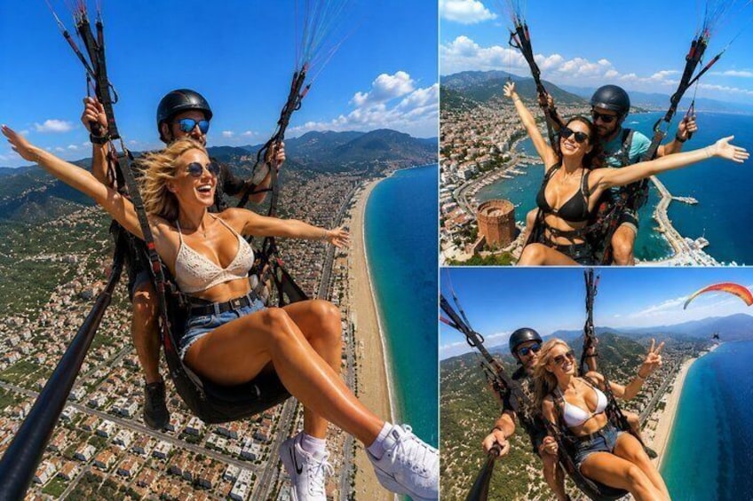 Eine Person gleitet mit einem Paragleiter über einer Stadtlandschaft und Küste im Hintergrund. 2