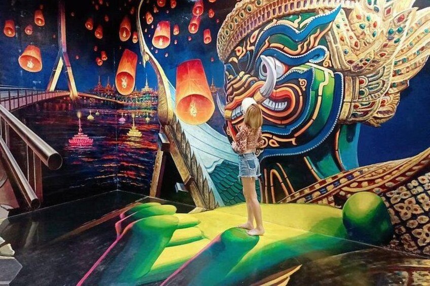 A mural with a large dragon, a bridge, and floating lanterns. 2
