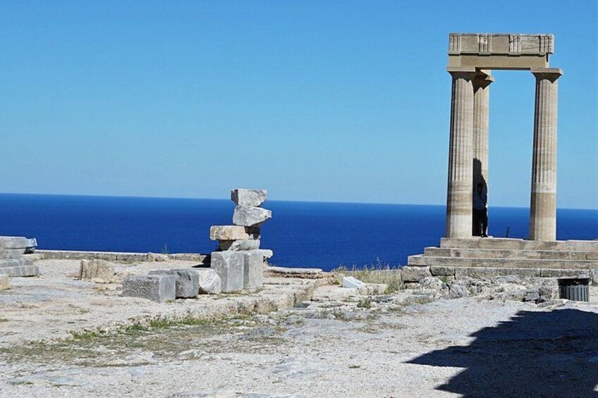 The base of a votive statue of Nike at Lindos. 4
