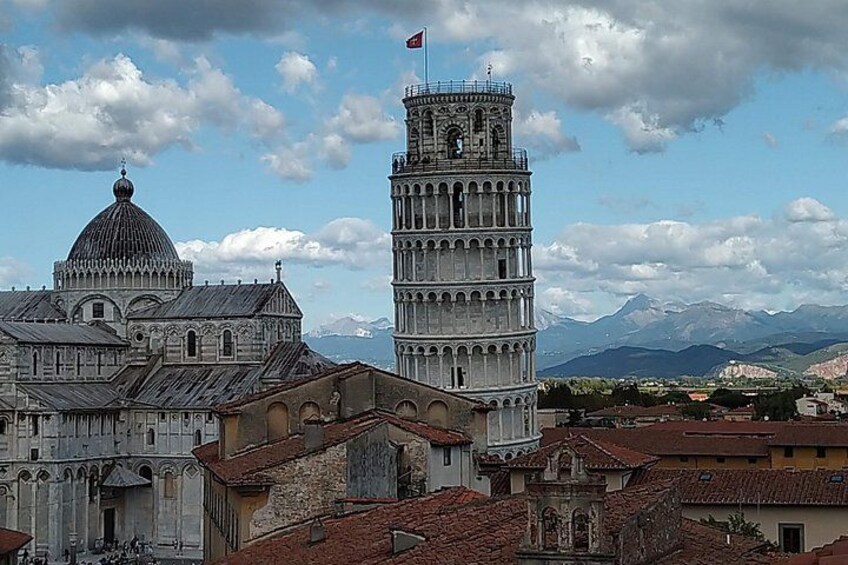 The Leaning Tower of Pisa, the Pisa Cathedral, and surrounding buildings. 3