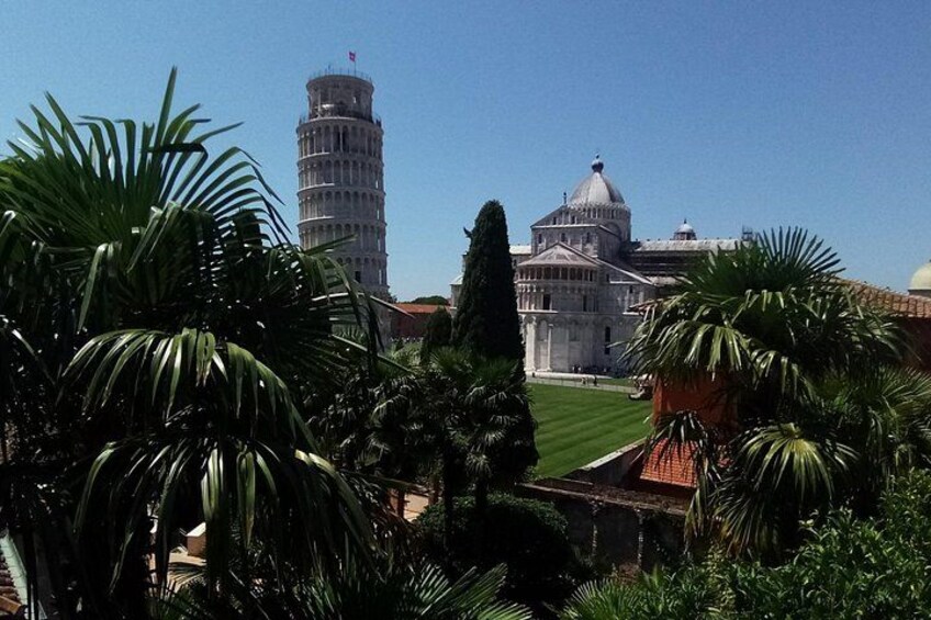 The Leaning Tower of Pisa, a bell tower, and the Pisa Cathedral. 2