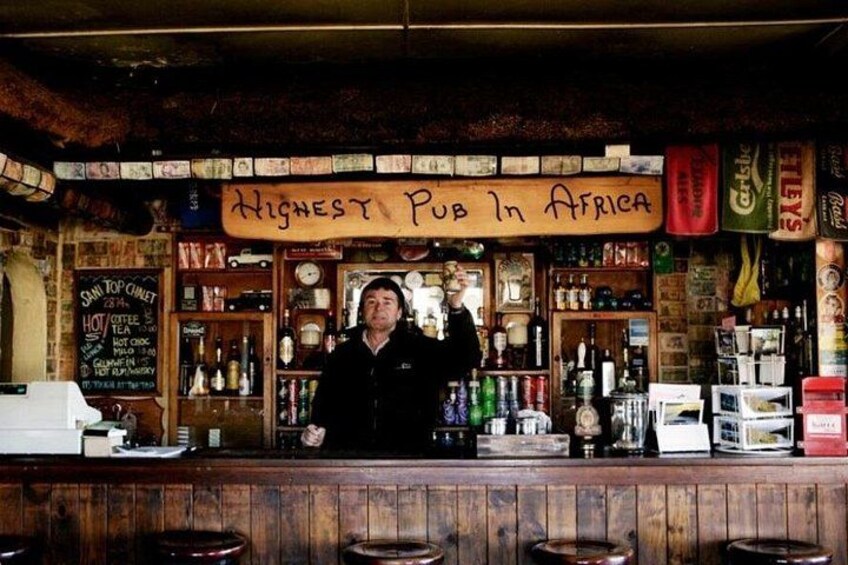 A bar with a sign that reads 'Highest Pub in Africa'. 5