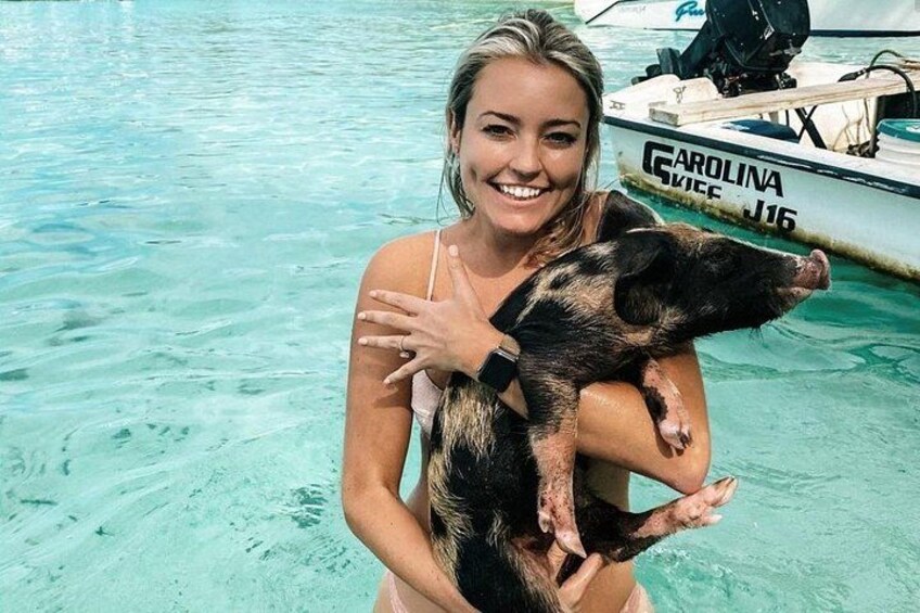 Swim with and feed the pigs of various sizes that call this island home. 2