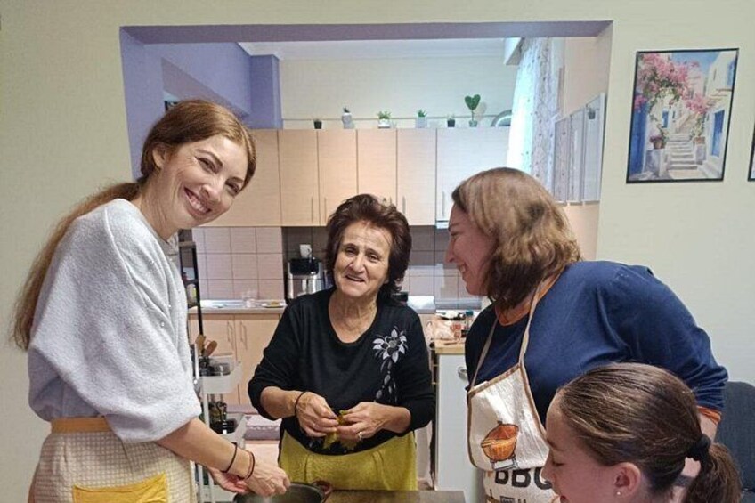 A kitchen with people cooking. 3