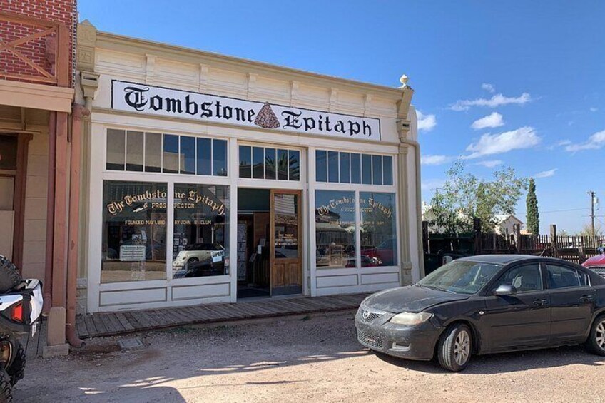 A building with a sign reading 'Tombstone Epitaph'. 3