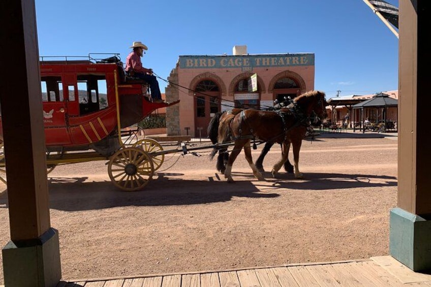 A horse-drawn carriage in front of Bird Cage Theatre. 5