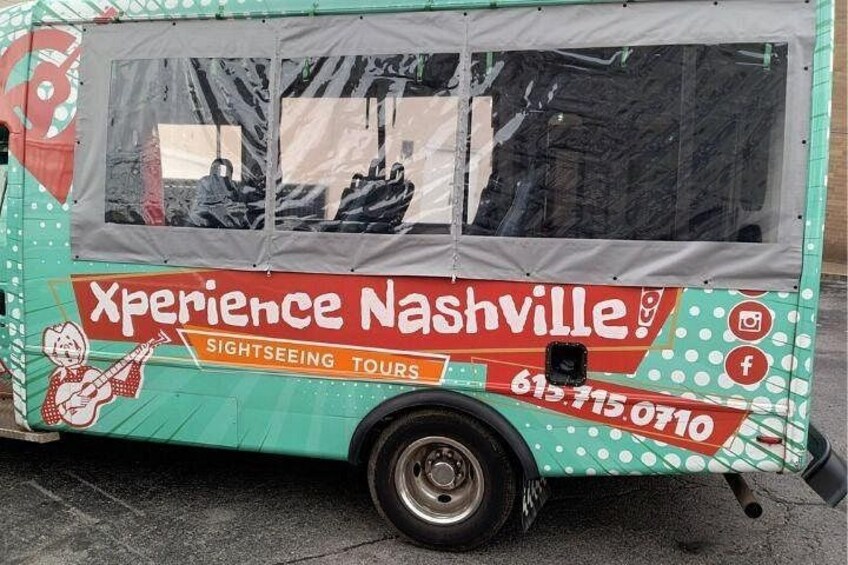 A green bus with 'Xperience Nashville Sightseeing Tours' and a contact number. 3