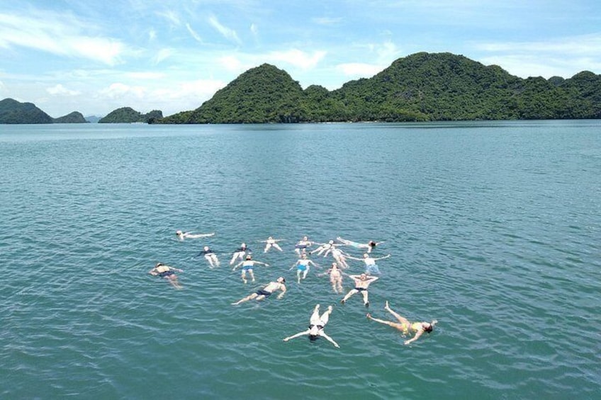 swimming in the middle of Ha Long bay 4
