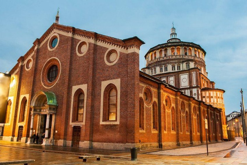 A historic building with a dome and arched windows. 3