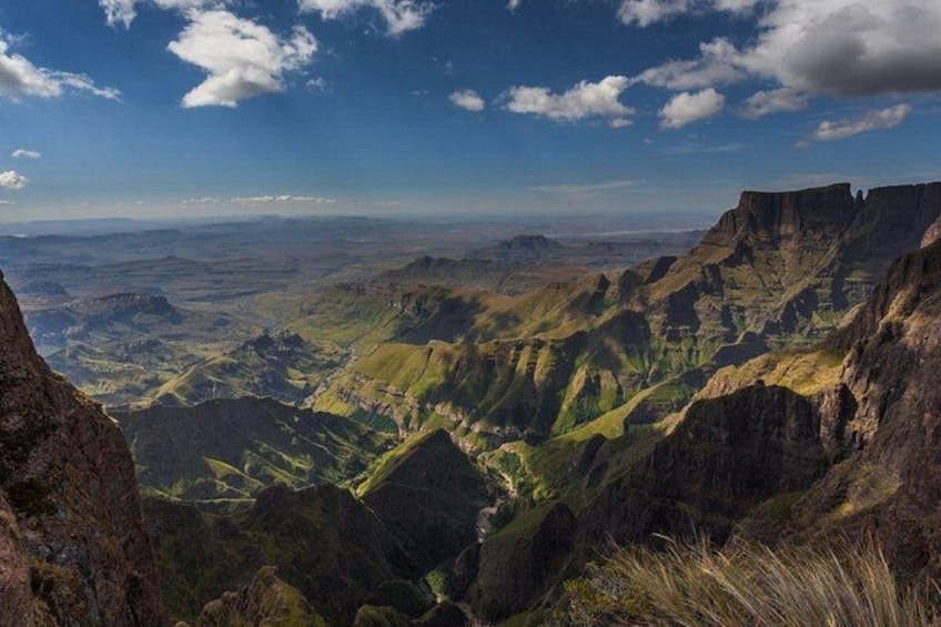 A mountainous landscape with valleys and cliffs. 2