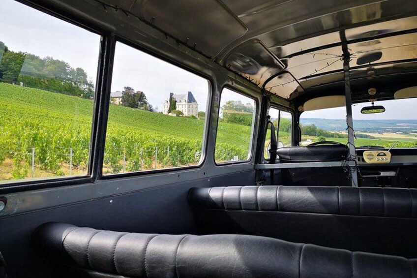 Enjoy the comfortable seat of our vintage car. 2