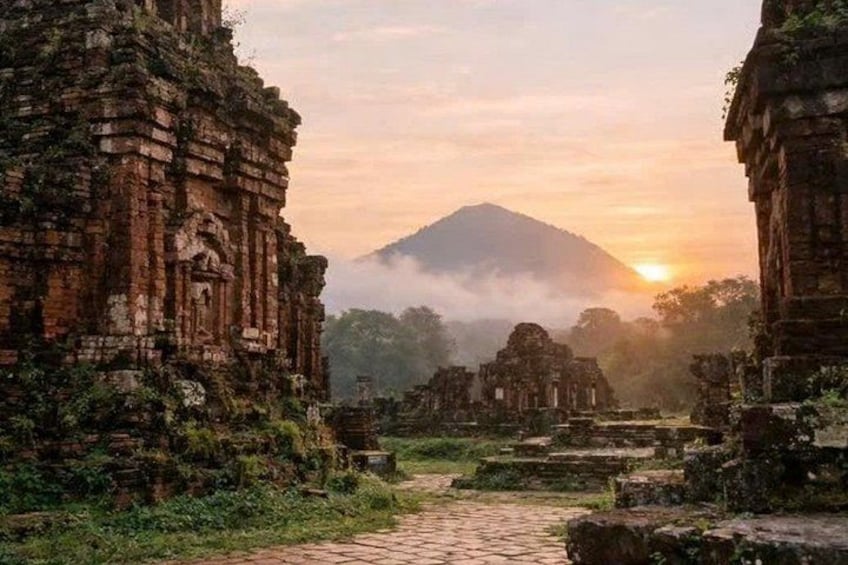 Ancient ruins with a mountain in the background. 1