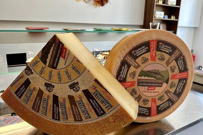 A circular wooden board with text and images, likely a menu or guide, with a knife placed on it. 2