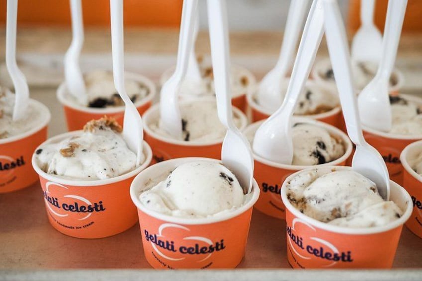 Ice cream cups with spoons and the text 'gelati celesti' on them. 2