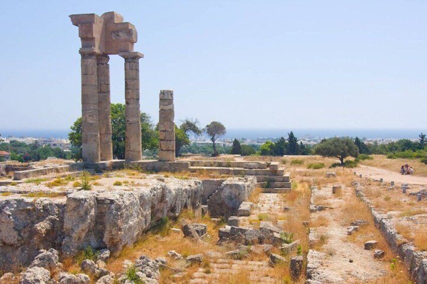Ancient ruins with columns and stone structures. 5