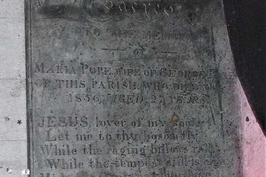 This gravestone can be found inside one of the buildings along the harbour 2