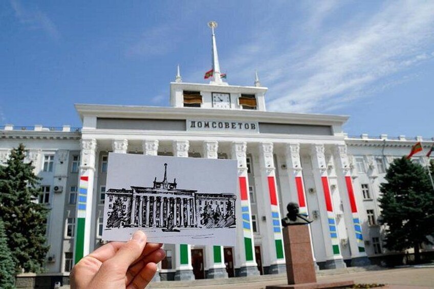 House of Soviets with postcard in front. Transnistria arts and tours by Anton Dendemarchenko. Welcome to Pridnestrovie, we make cognac not war ☭ 3