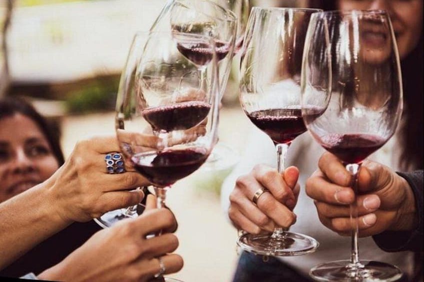 People holding wine glasses. 2