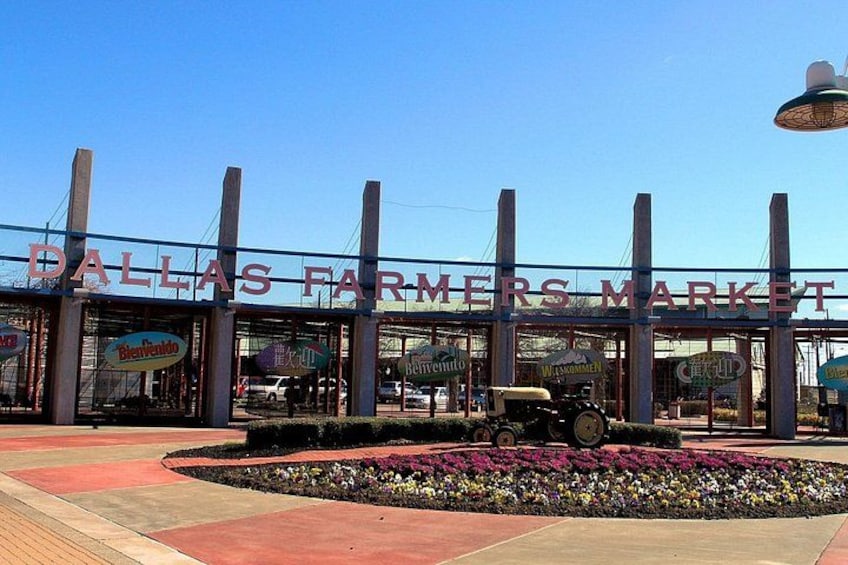 The Dallas Farmers Market with a tractor in front. 2