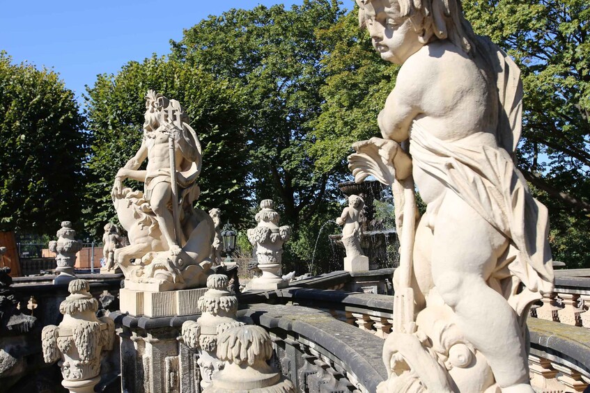 A classical fountain with statues and intricate designs. 5