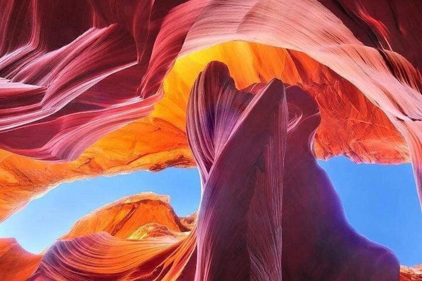 Un canyon aux formations rocheuses rouges et orangées. 2