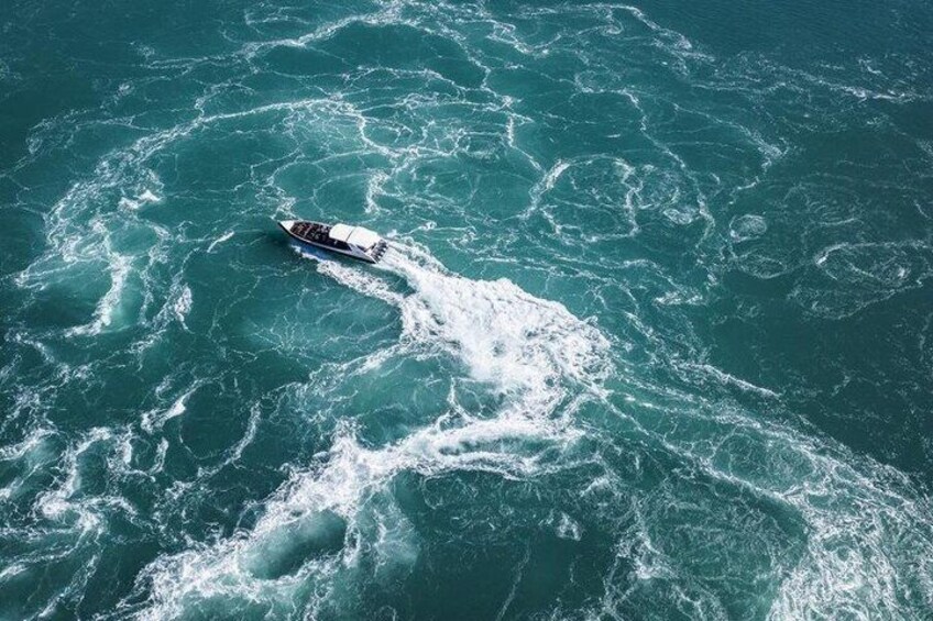A ship sailing on a turbulent sea. 4