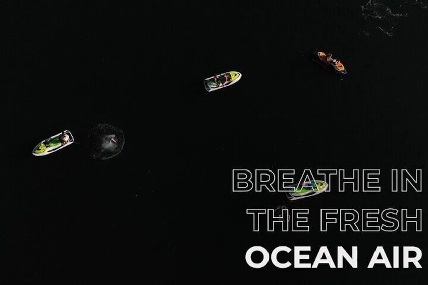 A dark sky with four boats. 1