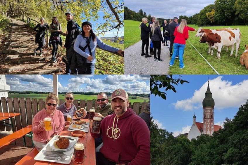 Un groupe de personnes en randonnée, une vache qui broute, une table à manger avec de la nourriture et des boissons, et une église avec un clocher. 1