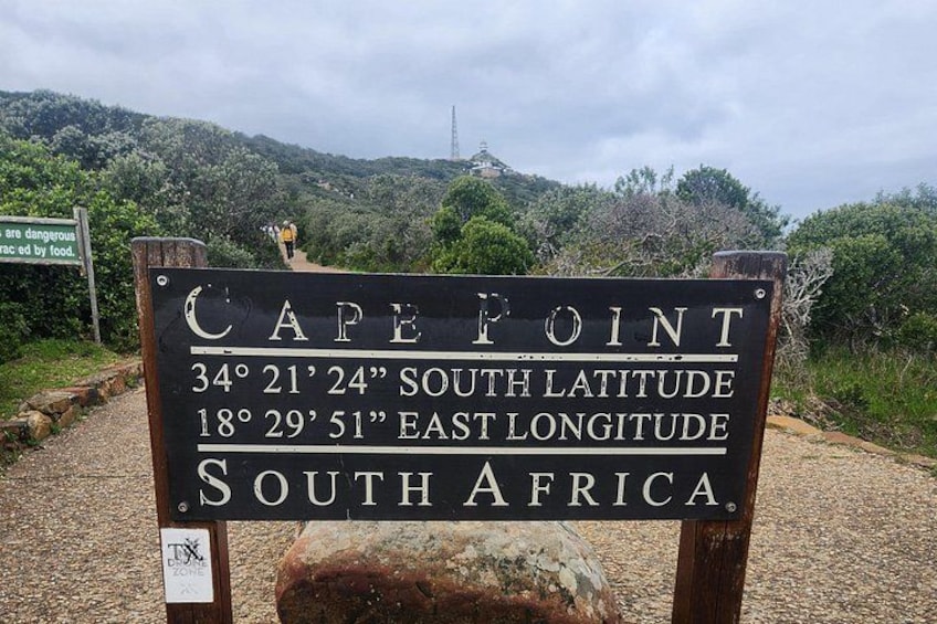 A sign indicating Cape Point's coordinates and location in South Africa. 5