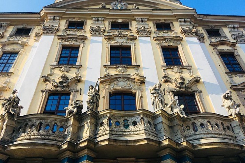 A classical building with ornate sculptures and columns. 2