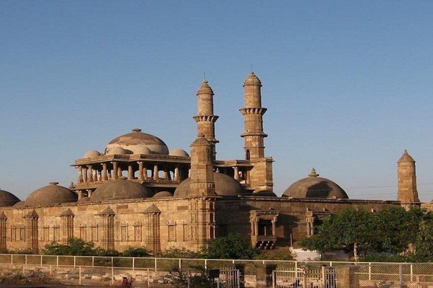 A large historical building with multiple domes and minarets. 3