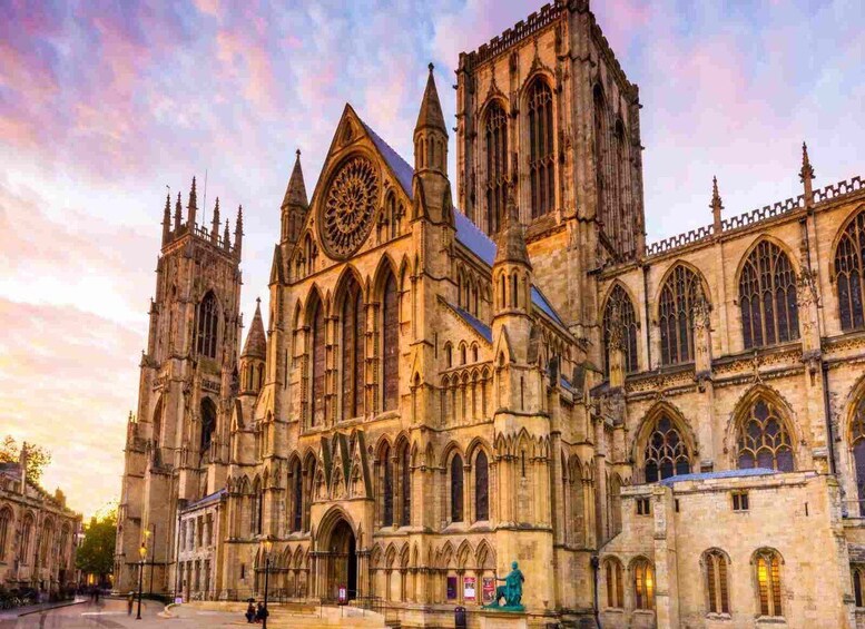 A large Gothic cathedral with intricate stonework and pointed arches. 2