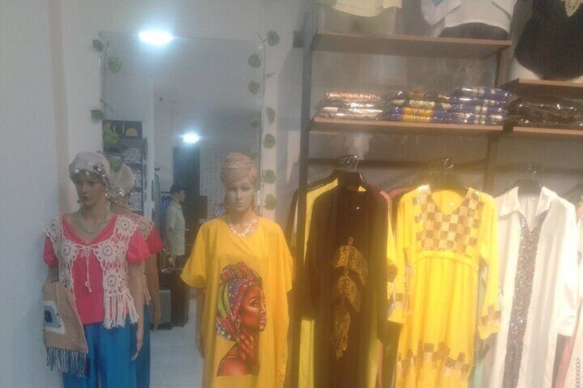 Mannequins in a store displaying clothing. 3