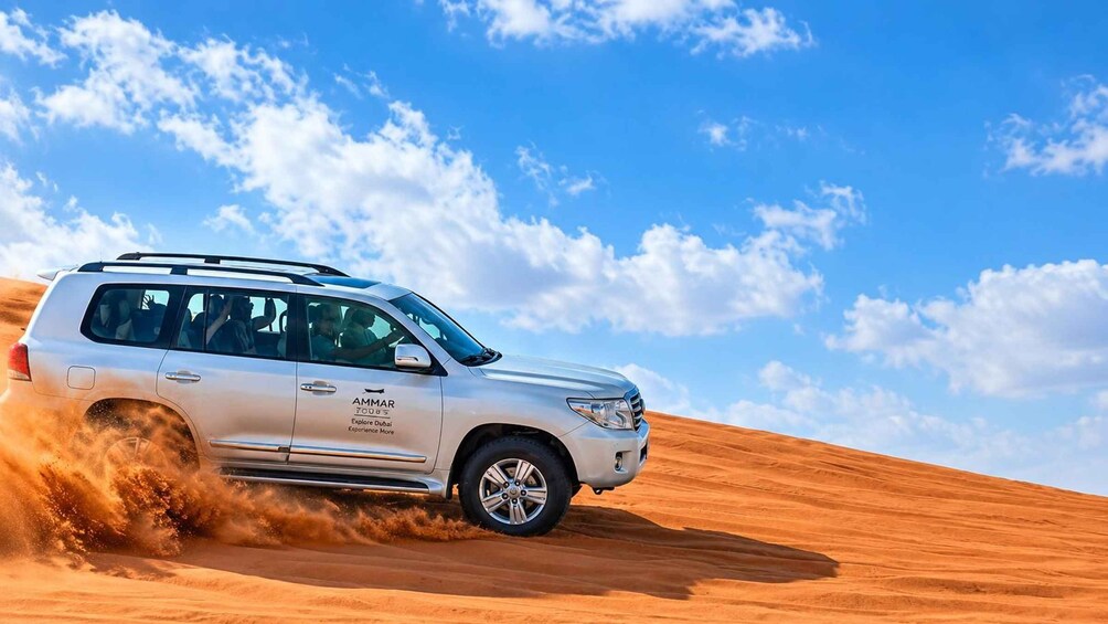 Dubai: Safari, Quad Bike, Camel Ride, and Buffet Dinner 1
