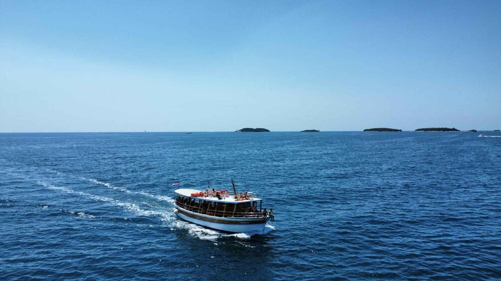 Picture 1 for Activity Rovinj sunset cruise with swim stop and all drinks included 5