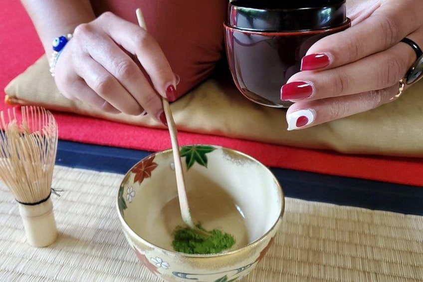 Adding matcha to a tea bowl. 2