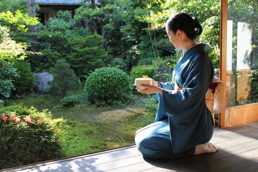 Taking a moment to enjoy the gardens. The teahouse gardens are designed to be enjoyed from within the house. 4