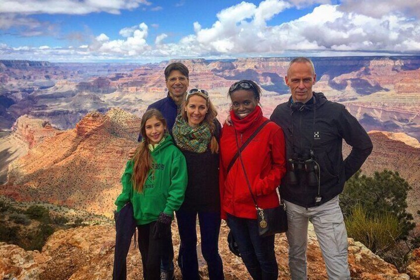 Tour group with a view from Desert View Watchtower in Grand Canyon National Park, Arizona