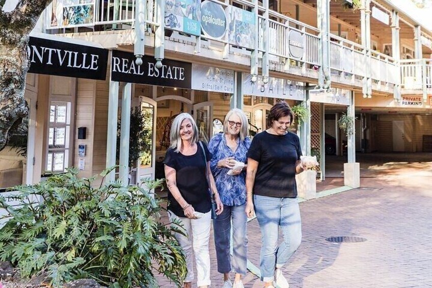 A building with a sign reading "ANTVILLE REAL ESTATE". 1
