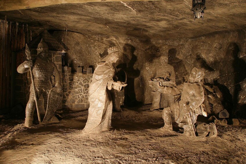 A cave with prehistoric cave paintings and stone carvings. 5