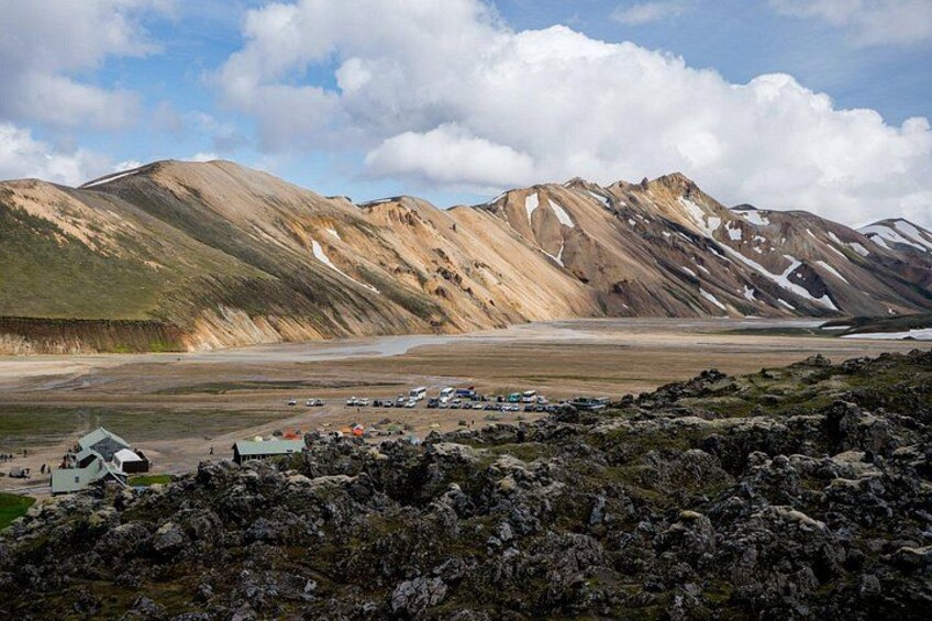 Standing on the lava field in Landmannalaugar looking over to the huts. The most characteristic mountain for landmannalaugar, Mt. Barmur in back. 5