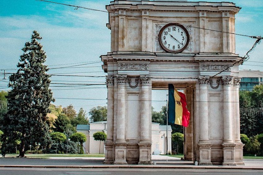 A clock tower with a flag. 3