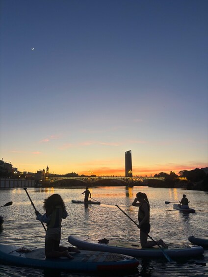 Picture 3 for Activity Seville: Sunset and Evening Paddle Boarding Tour 4