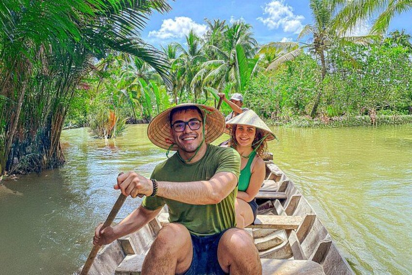 Taking a rowing boat through the coconut canals of Ben Tre 2