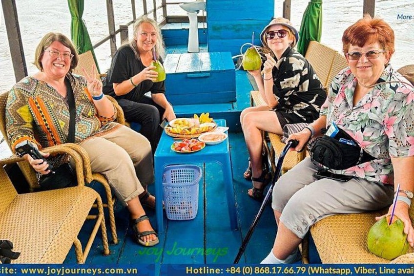Having fruit and coconut juice while cruising 2